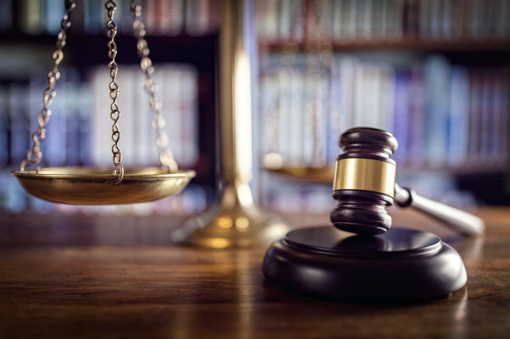 gavel, scales of justice and law books